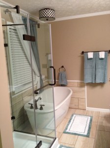 We added a frameless glass shower and a freestanding tub.